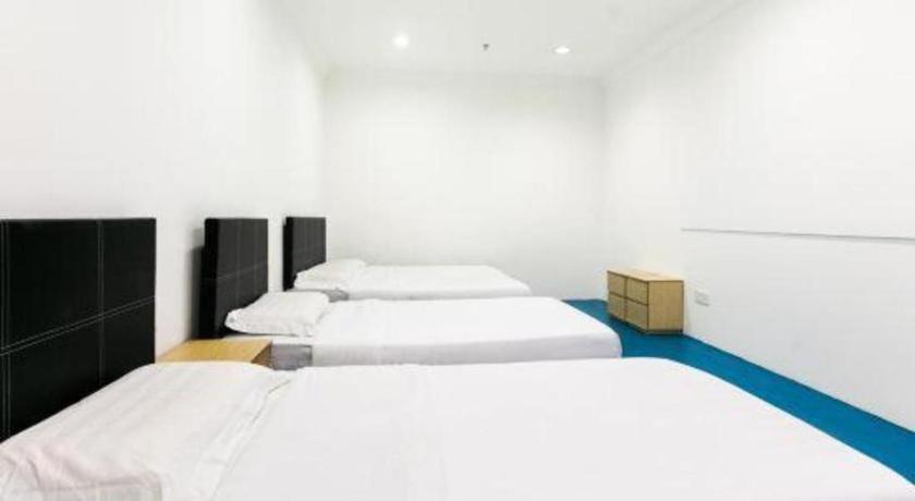 Spot On 89726 Capsule Inn Кота-Кинабалу Экстерьер фото