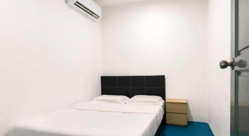 Spot On 89726 Capsule Inn Кота-Кинабалу Экстерьер фото