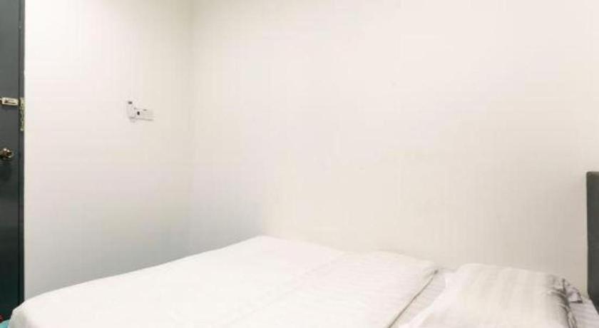 Spot On 89726 Capsule Inn Кота-Кинабалу Экстерьер фото